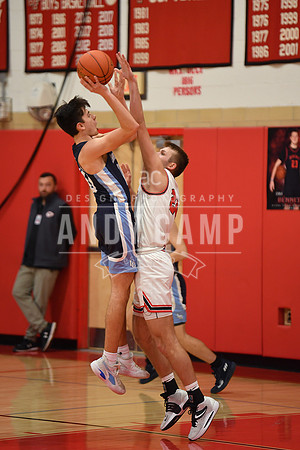 Cooper Nadler (24) tries to block Aiden Osborne's shot.