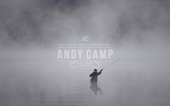 Fly fisherman in the fog in Lake George